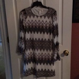 Dress with sleeves that flare